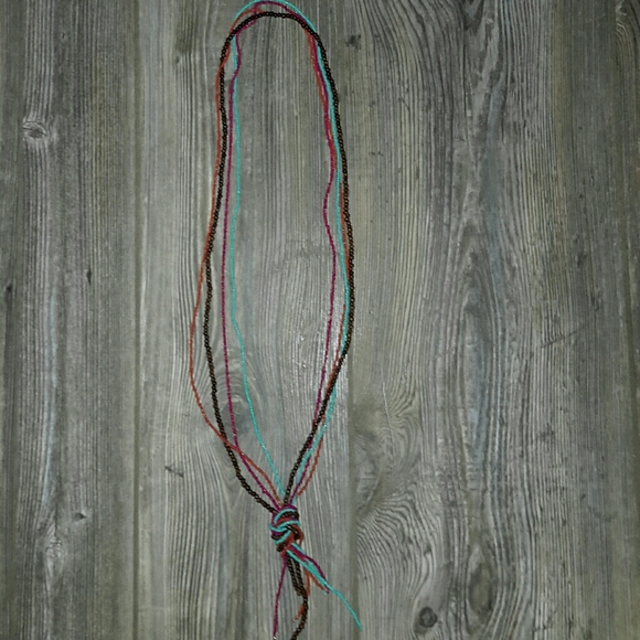 A white dress with For Colored beaded necklace - Picture 6 of 7